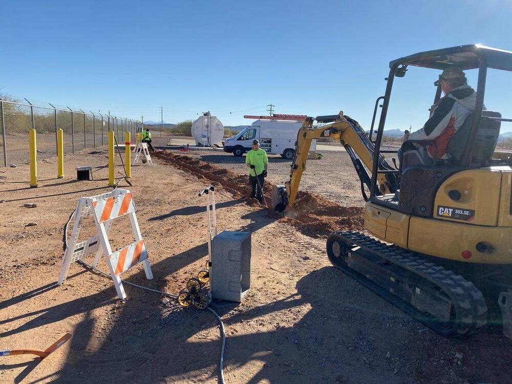 Trenching for underground conduit on a commercial site
